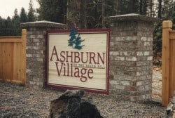 carved wooden signage